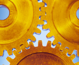 Cogs gold blue background 155x128px