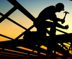 silhouette of a construction worker on a construction site