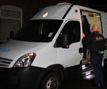 GLAA officer making Arrest Op sidebar police van