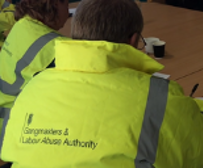 back of a GLAA officer's high vis jacket with GLAA logo