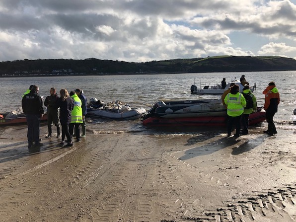 GLAA officers working with partners on beach