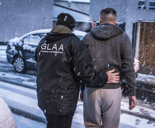 GLAA officer making an arrest in snow Liverpool