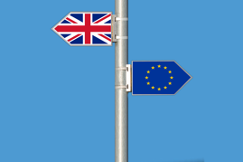 pole with a Union Jack flag on one side and EU flag on the other
