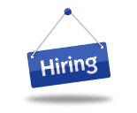 Blue sign hanging from pin text reads Hiring.png