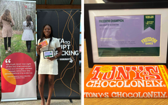 Right smiling Altine Bootha-King in front of pop up banners holding certificate and chocolate right close up of certificate and chocolate